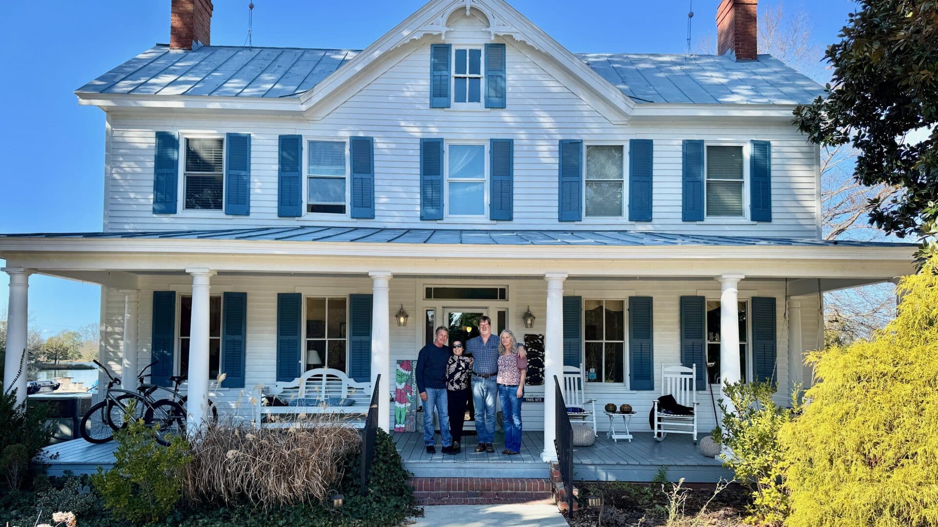 Front porch of the Inn at Tabbs Creek - with buyers and sellers