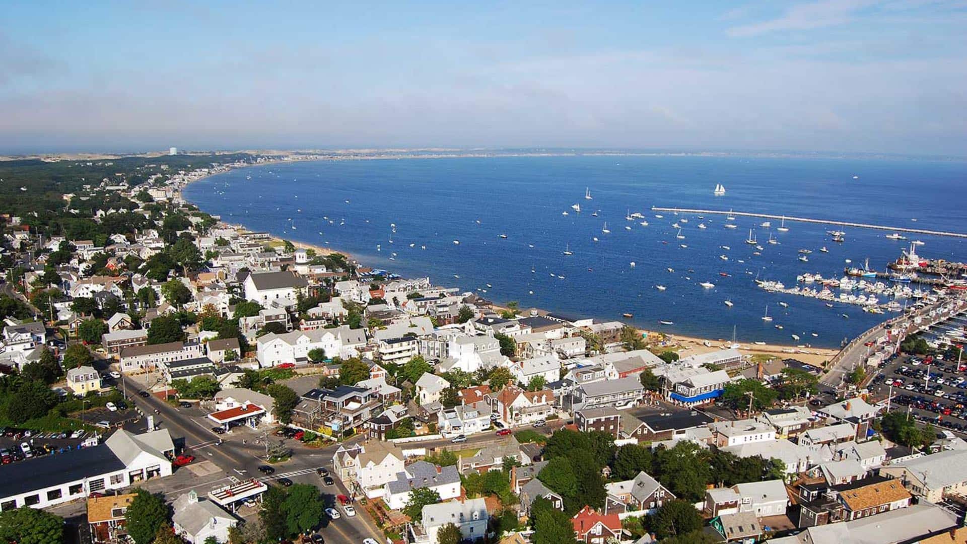 Aerial view of coastal town with a marina