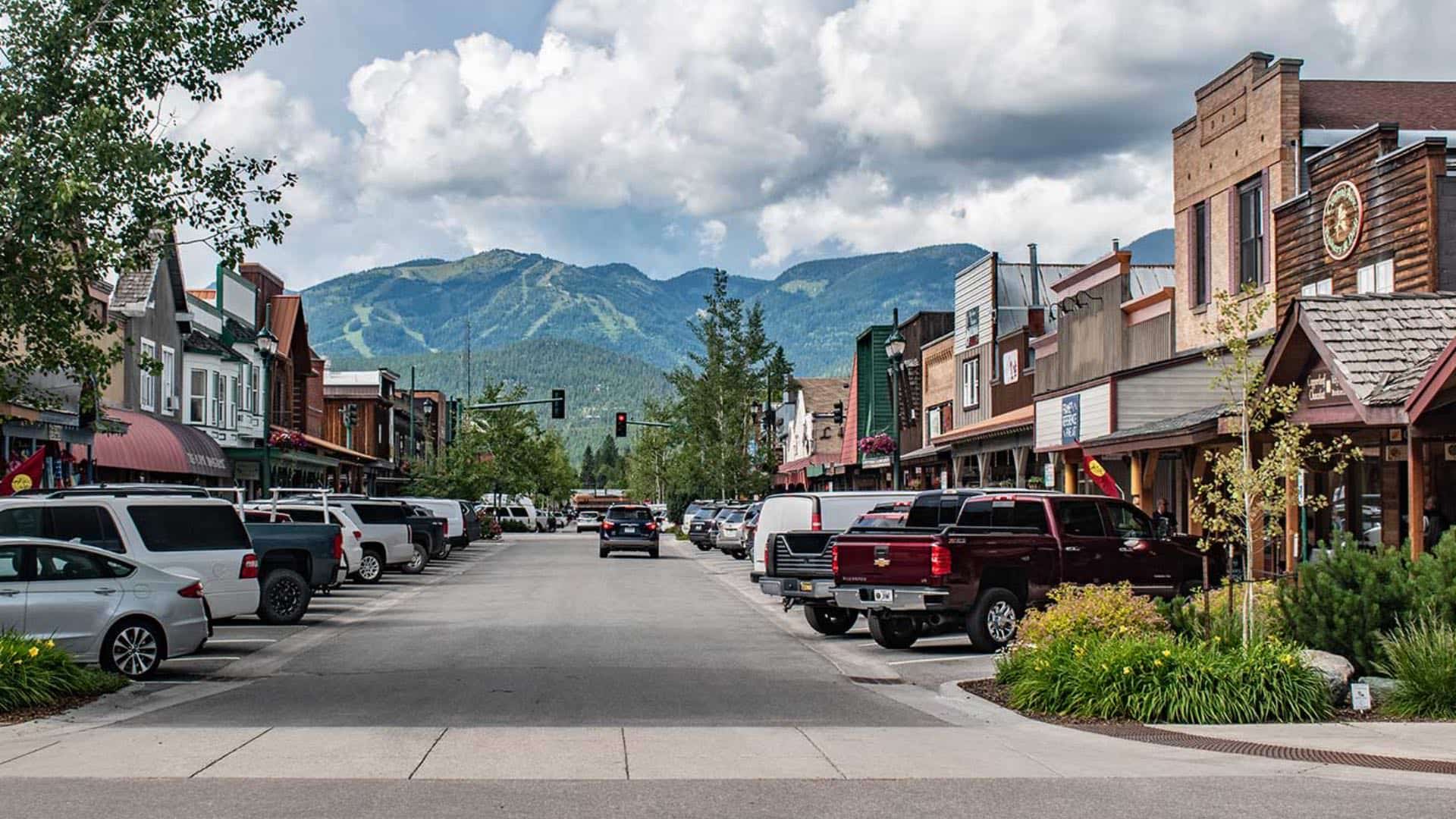 Small downtown retail area with mountains in the background