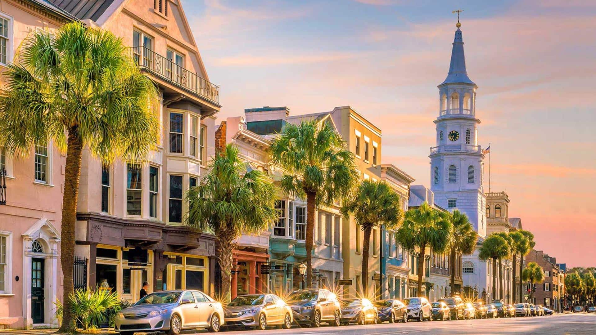 Downtown view of a city with palm trees at dawn